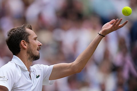 Daniil Medvedev serves to Carlos Alcaraz